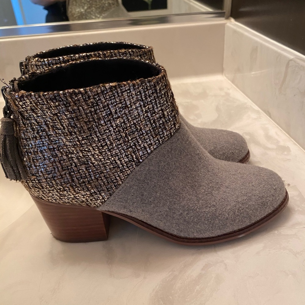 Tom’s grey booties
